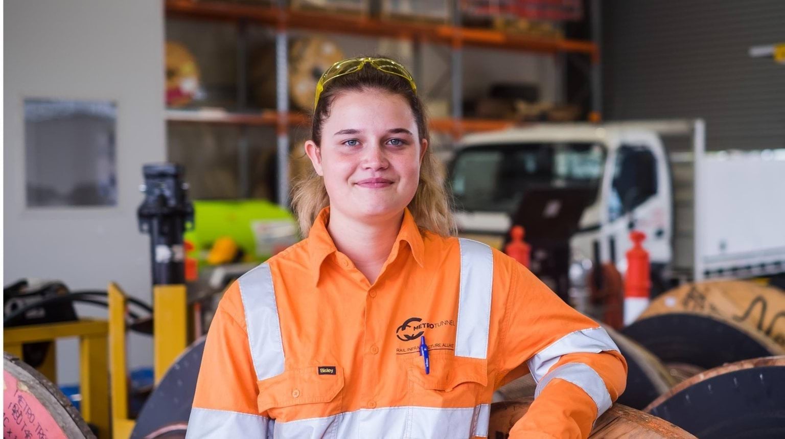 Female apprentice on a job site.